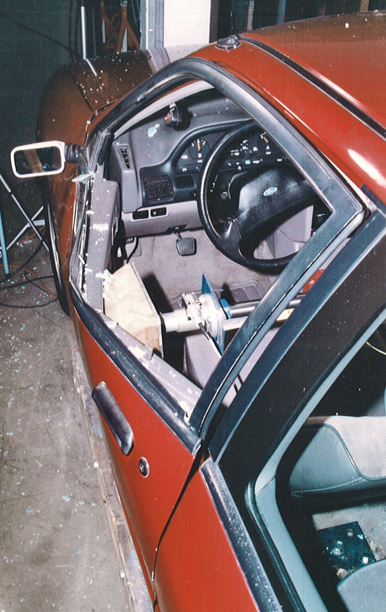 A car door being tested for strength