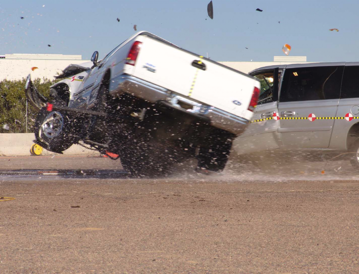 Two vehicles mid-crash